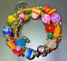 Eclectic Bohemian Layered Bracelet with Colorful Beads and Wood Charm Design