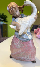 Lladro gres duck pulling pigtail