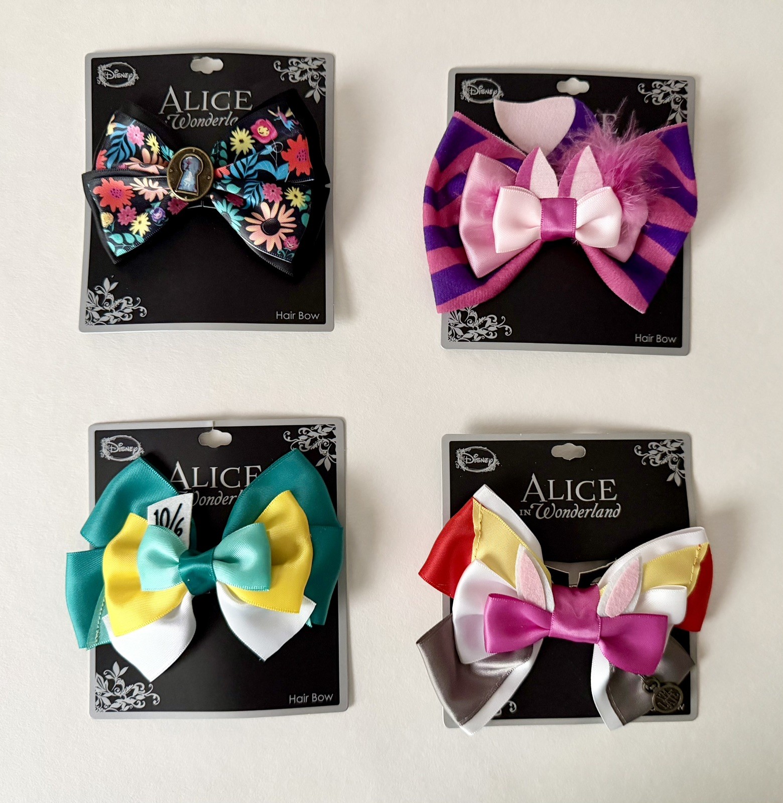 Disney high intenCITY Alice Cheshire Hatter Rabbit hair bow clips Lot of 4 NEW
