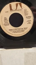 BILL CONTI  7" 45 RPM "Gonna Fly Now (Theme From Rocky" & "Reflections" VG+ cond