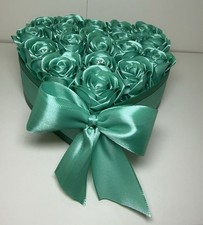 heart with 19 turquoise roses, handmade, with a diamond in each rose. handmade.