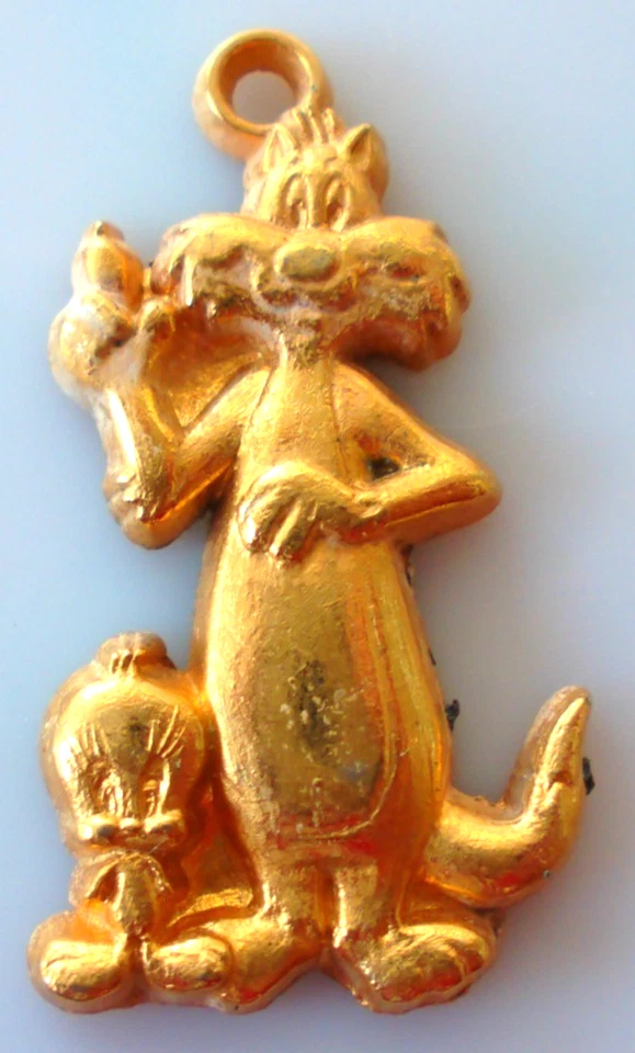 Fève métal doré pendentif - TITI ET GROSMINET WB 1990 - Photo 1/1