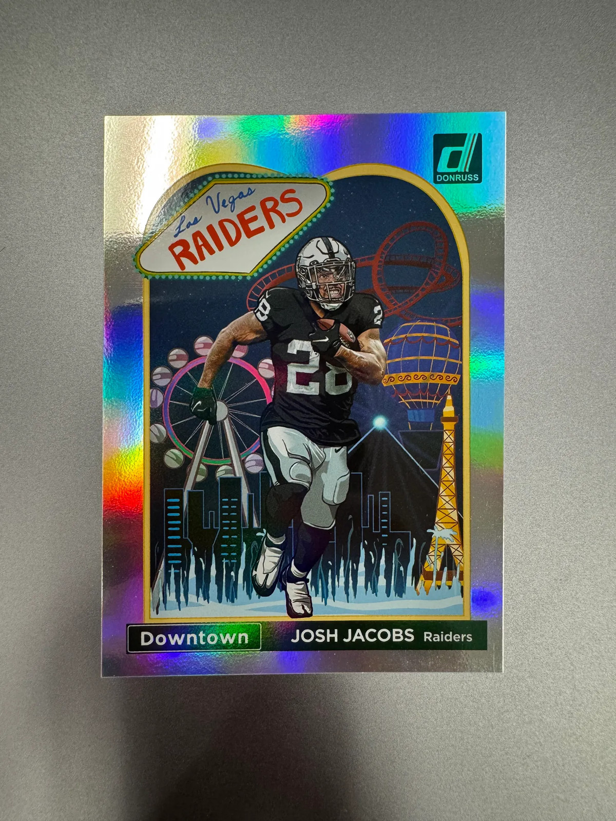 2023 Panini Donruss Downtown Josh Jacobs #D-12