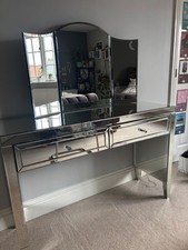 Mirrored glass dressing table. Good used condition. Trifold mirror on top