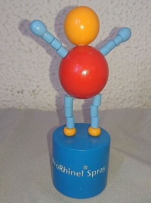 Antique Toy Pusher Wakouwa prorhinel spray a man wooden painted