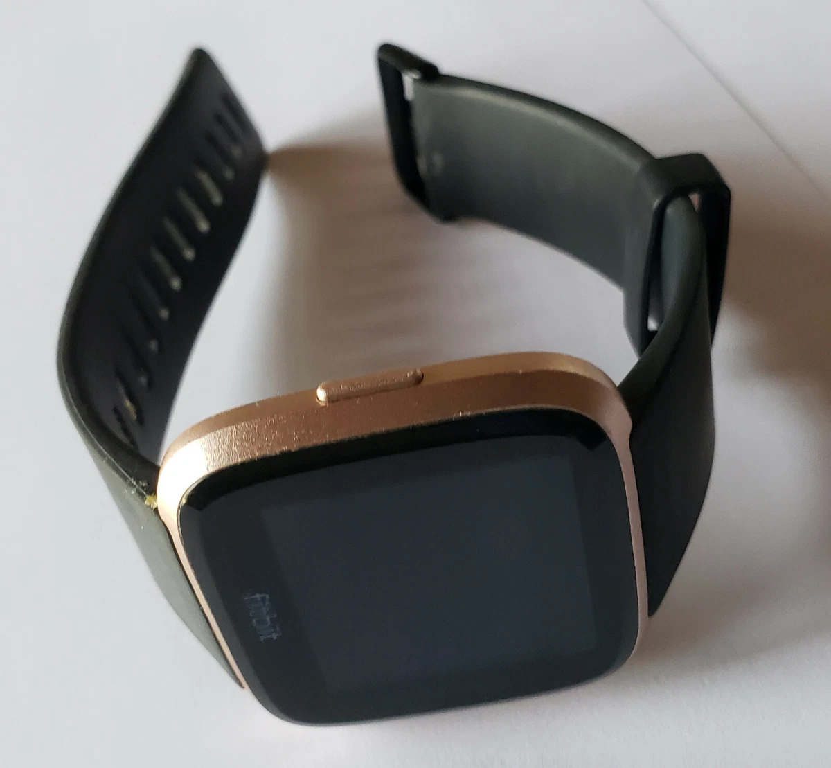 Rose gold fitbit sales with black band