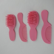 4 Vintage Pink Doll Comb Brushes