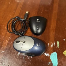 Logitech Cordless Click! Plus M-RAA89 Optical Mouse Blue 6-Buttons Scroll Wheel