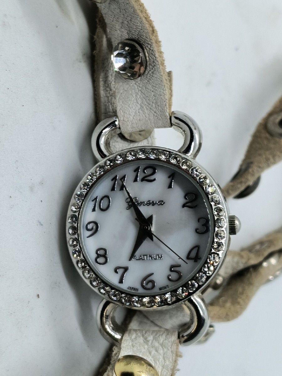 Geneva Platinum NO:9540 LC. White jeweled and studded wrap around