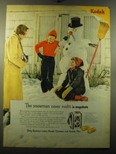 1950 Kodak Duaflex Camera Ad - The snowman never melts in snapshots