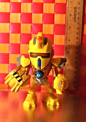 Action figure, Gold and Yellow character, w/accessories, 5'' H, by Moose