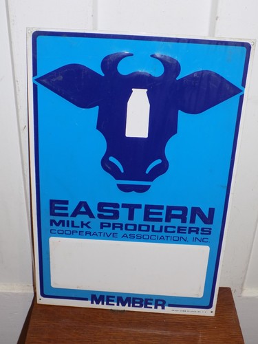 Vintage Eastern Milk Producers Embossed Metal Sign