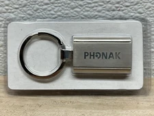 2007 josTTech GmbH Phonak Hearing Battery Carrier Keychain Made In Switzerland