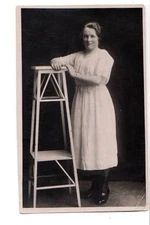 RPPC real photo of attractive All American Girl casual dress fashion pedestal