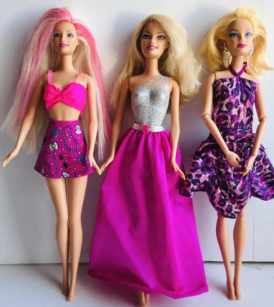 Three sales barbie dolls