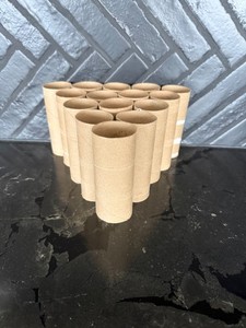 15 toilet paper rolls, cleaned and still round.