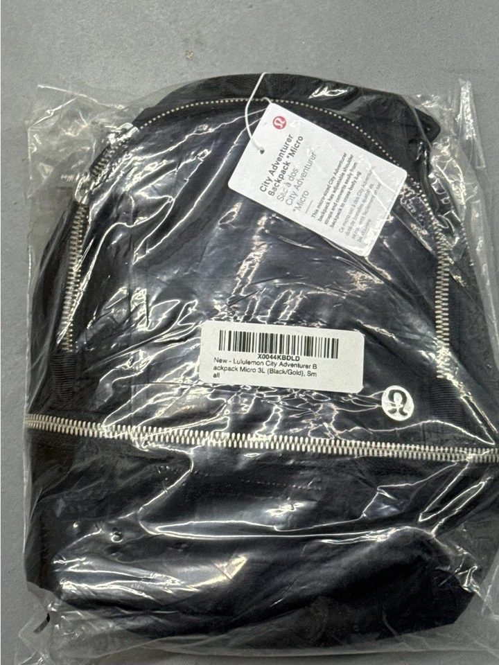 Mochila NUEVA CON ETIQUETAS LULULEMON CITY ADVENTURER Negra Plata 3L ENVÍO GRATUITO Foto 2 de 4