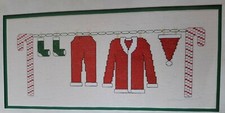 Cross Stitch "THE DAY AFTER CHRISTMAS" pattern  clothesline, coat, socks, hat