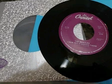 The Beatles - I Saw Her Standing There / I Want To Hold Your Hand 1988 7" Vinyl 