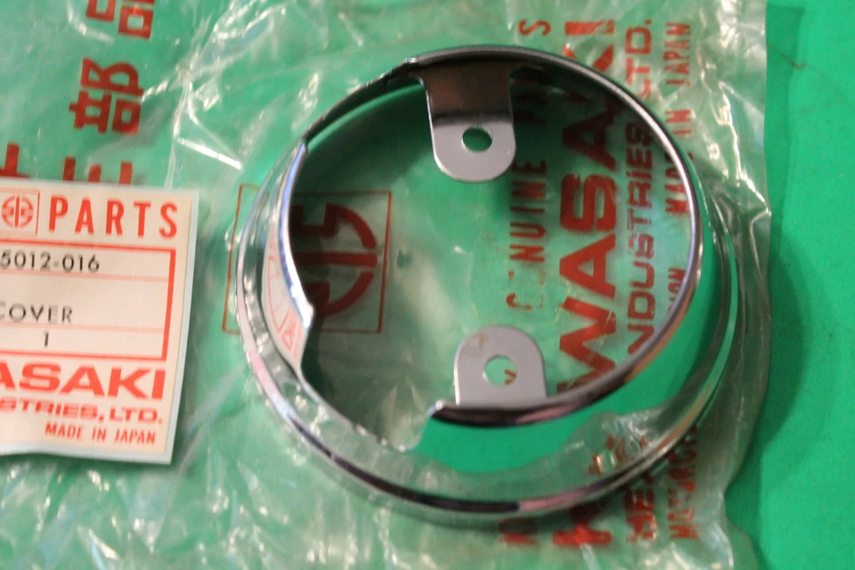 Cubierta metálica del velocímetro Kawasaki G4TR G5 1974-75 NUEVO EN STOCK 25012-016 Foto 2 de 4