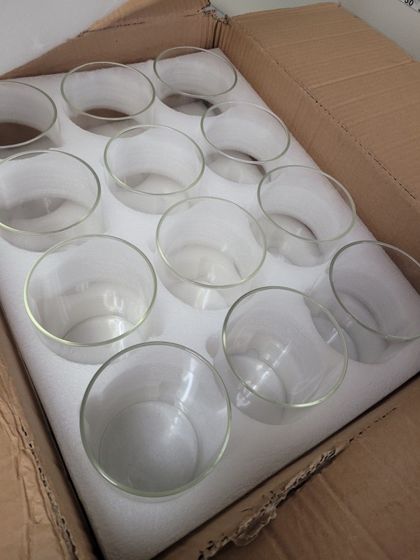 12 Used Lidless Glass Jars  6" Tall And 4" Diameter No Cracks