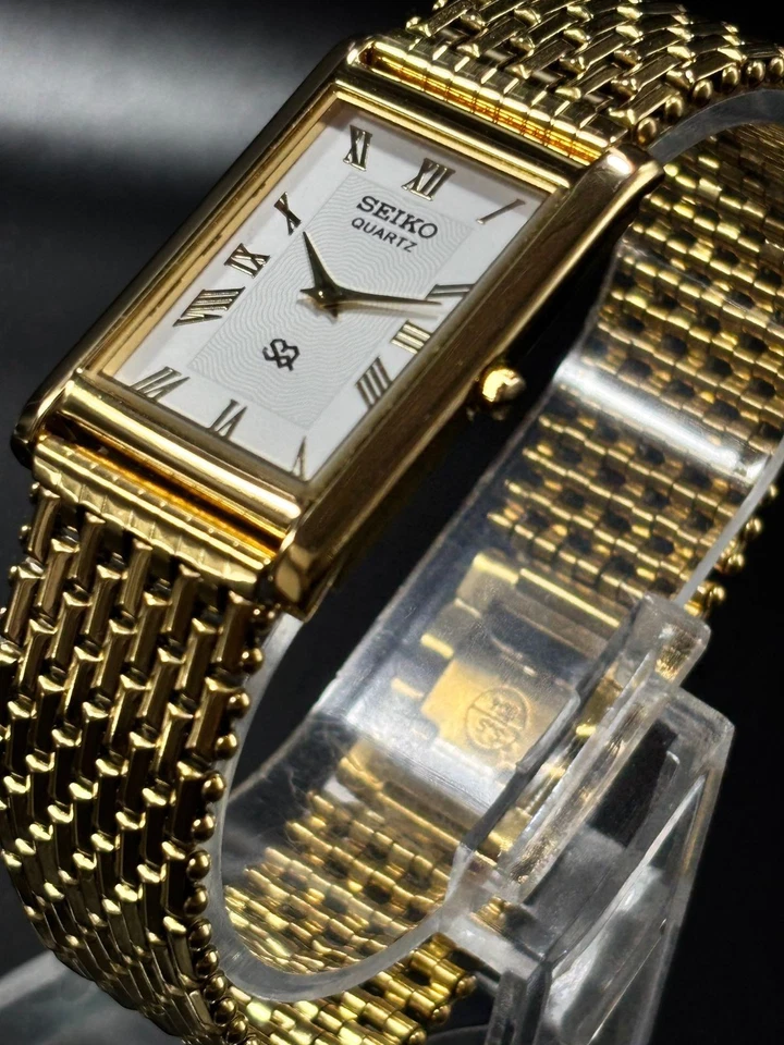 Reloj de pulsera vintage Seiko de cuarzo delgado para hombre | Chapado en oro | Esfera blanca romana Foto 3 de 4
