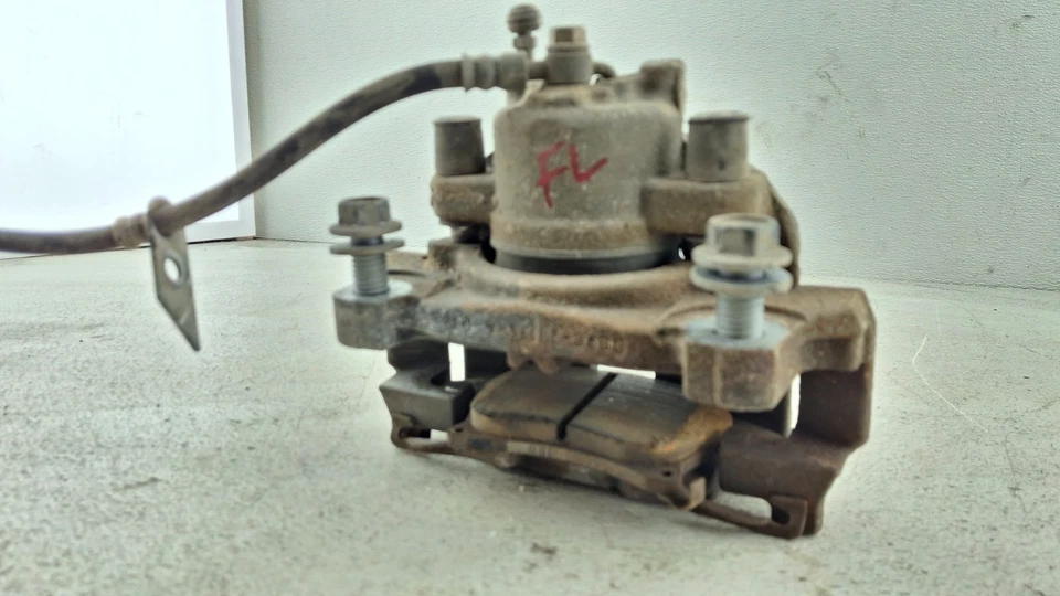 Pinza de freno de disco delantera izquierda Ford Fusion 2013-2020 OEM Foto 3 de 4