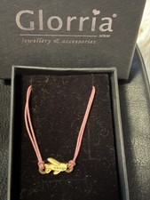 Bracelet Made With 14 carrot, Plated, Gold Charms Features An Airplane And Fortu