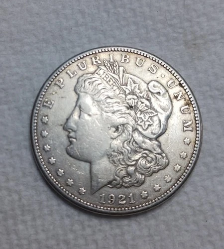 1921 S Morgan Silver Dollar. Estimated About Uncirculated AU 55/58. Video M0014.