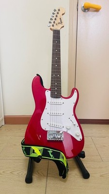 The  Squier Mini Stratocaster Electric Guitar-Bag, picks,strap etc.included