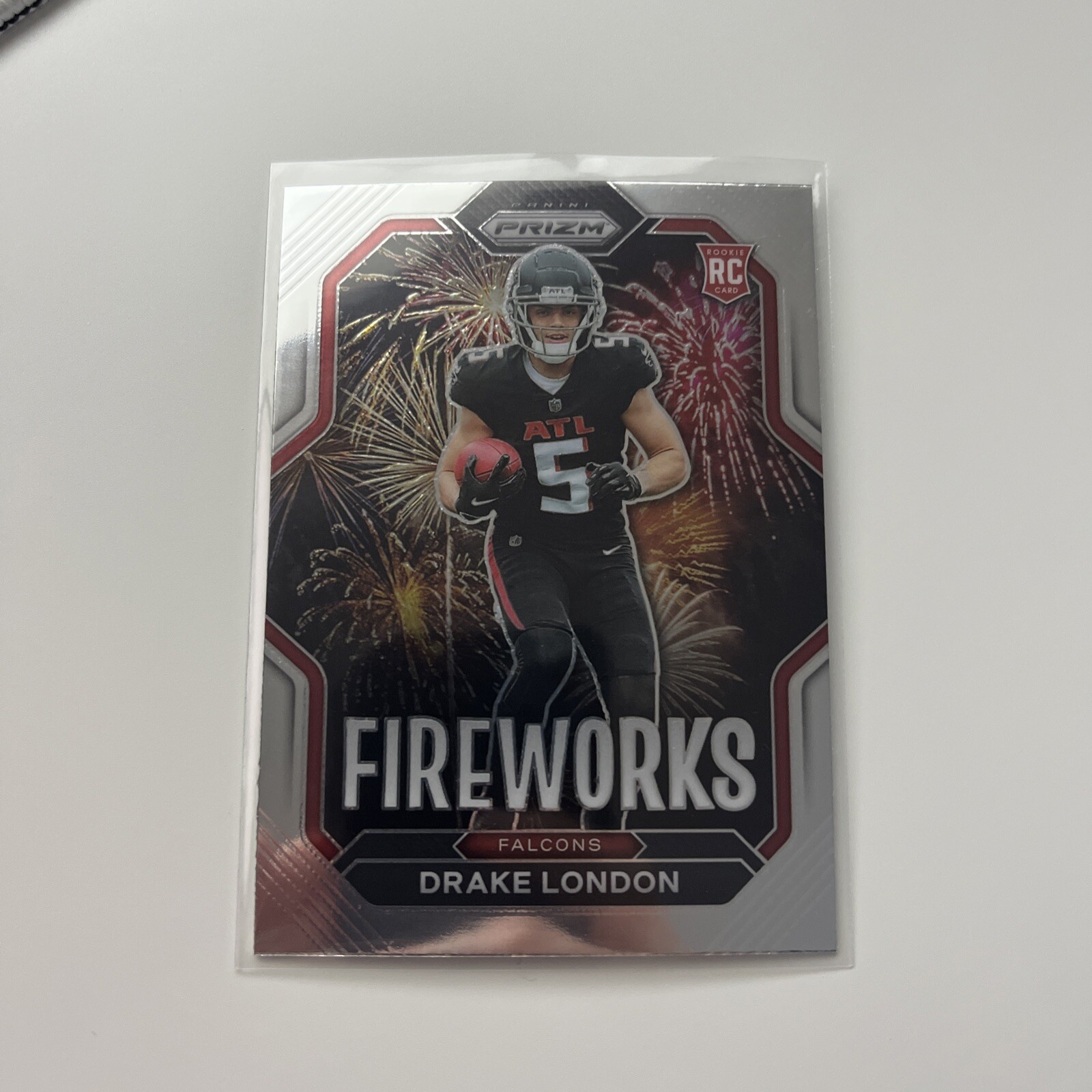 2022 Prizm Drake London Silver Prizm Fireworks RC #20 Atlanta Falcons