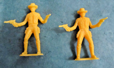 Vintage MPC yellow cowboy with guns plastic figure toy