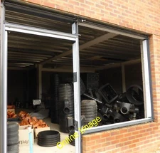 Photo 12x8 Drainage for sale? Bourne/TF0920 The new shops in Wherry' c2013