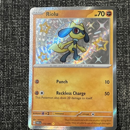 Riolu 173/091 SV: Paldean Fates Holo Pokemon