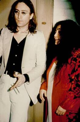 John Lennon a pregnant Yoko Ono attend a performance of the Broadw- Old Photo