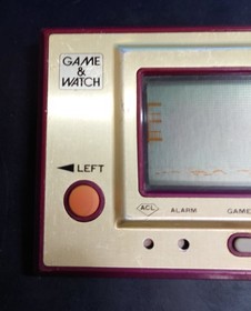 [in hand] nintendo game watch helmet cn-07