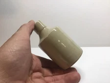 Small Antique Cream Colored Stoneware Ink Bottle. 4 Inches Tall.