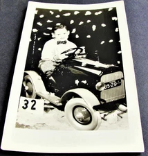 Cute Boy Rides Children's Car-Real Photo Postcard- Stamp Box- AZO (1918-1930).