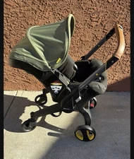 Doona Baby Car Seat & Stroller - Olive Green New Open Box