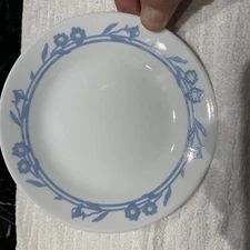 Corelle Cornsilk Saucers Blue & Yellow Flowers. Size 6 3/4”