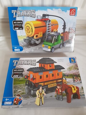 2 Ausini Züge Eisenbahn Förder Bausets Cowboy und Arbeiter MIB