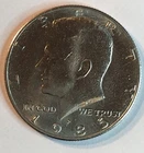 1985-P UNCIRCULATED KENNEDY HALF DOLLAR