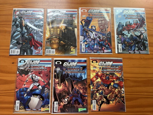 lot of 7 DDP & image comics - G I JOE VS TRANSFORMERS - bagged & boarded - NM/M