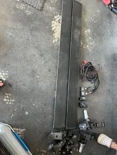 AMP Research Electric Lighted PowerStep Running Boards for Yukon Tahoe Escalade