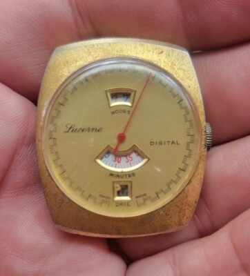 VINTAGE 1960's LUCERNE JUMP HOUR MECHANICAL DIGITAL GOLD TONE DATE WATCH  AS IS