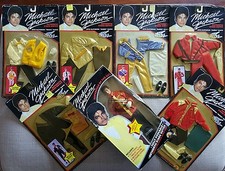 Michael Jackson figura snodabile del 1984 + 6 costumi + Autografo su press kit.