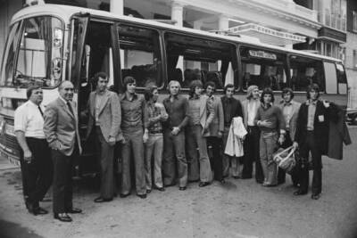 The England team pose in front of the team bus ahead of their frien - Old Photo