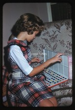 Girl on couch with Water Color Paint set Christmas Jewelry Bracelet 1961 slide