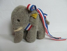 Steiff vintage elephant has button in ear Added red white blue ribbon