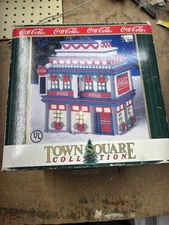 Coca-Cola light up Christmas village Moe’s Cafe 1998